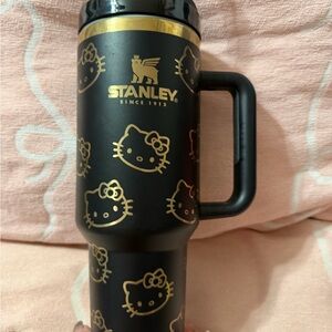 Stanley Black and Gold Travel Mug